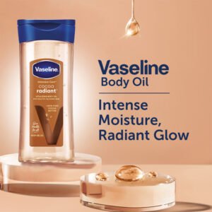 Vaseline Cocoa Radiant Body Oil with Pure Cocoa Butter & Shimmer Glow, For Dull Skin & Healthy Glow (200ml)Vaseline Intensive Care Cocoa Radiant Body Oil is designed to deeply nourish dry skin using the goodness of cocoa butter. Its non-greasy formula absorbs quickly and leaves your skin feeling soft and hydrated. Perfect for daily use, especially post-shower, it restores moisture and enhances your skin’s natural glow.  Features:  Restores moisture and enhances natural glow Enriched with cocoa butter to deeply nourish dry skin Fast-absorbing, non-greasy formula Leaves skin soft, smooth, and hydrated Ideal for daily post-shower use Dermatologically tested, cruelty-free and free from paraben  About the Brand: Vaseline has been dedicated to skin health since 1870, with a commitment to supporting all skin types across every stage of life. Rooted in a mission to promote healing and nourishment, the brand continues to advance skin care so that healthy, resilient skin can be accessible to everybody, everywhere.    Explore the entire range of Body Lotions & Moisturizers available on Nykaa. Shop more Vaseline products here.You can browse through the complete world of Vaseline